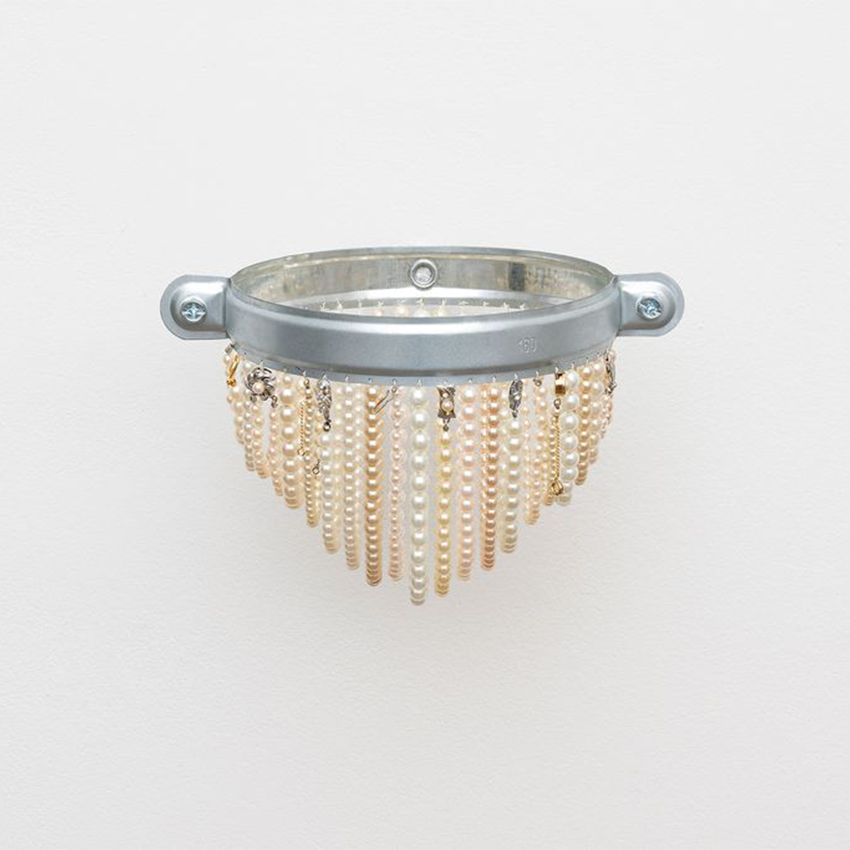 Abrazadera de perlas